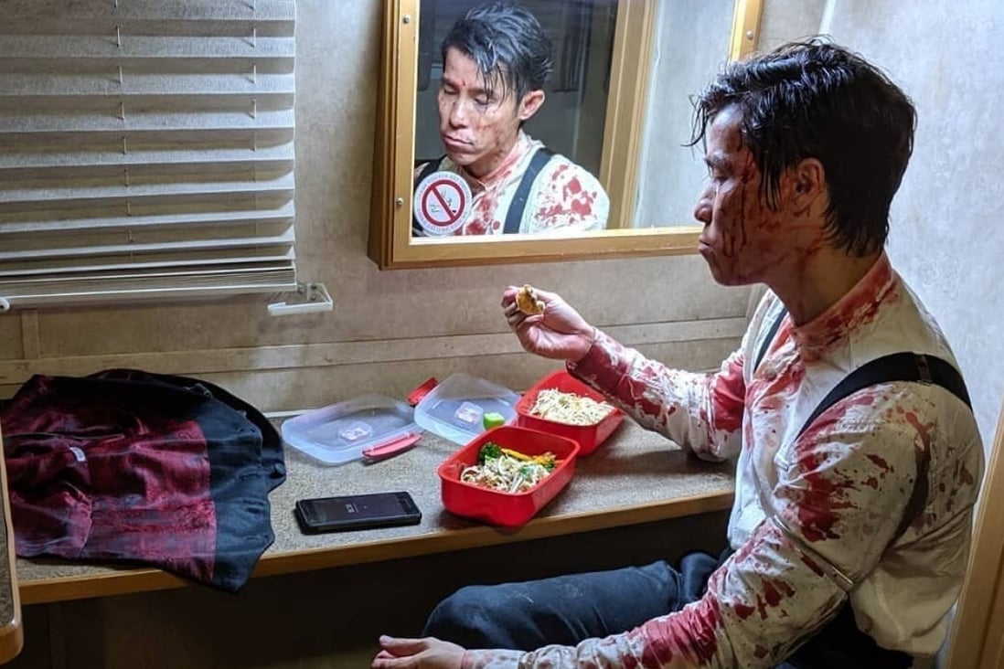 Jason Tobin eats after filming an intense fight scene during episode nine of season two of ‘Warrior’. Photo: Instagram/@perryyungofficial