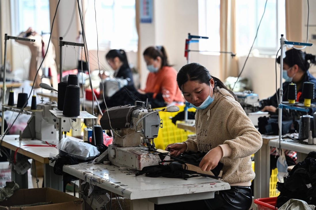 Chinese manufacturers are churning out goods to meet demand as Asian neighbours such as India struggle to get their economies back on track amid a surge in coronavirus cases. Photo: AFP