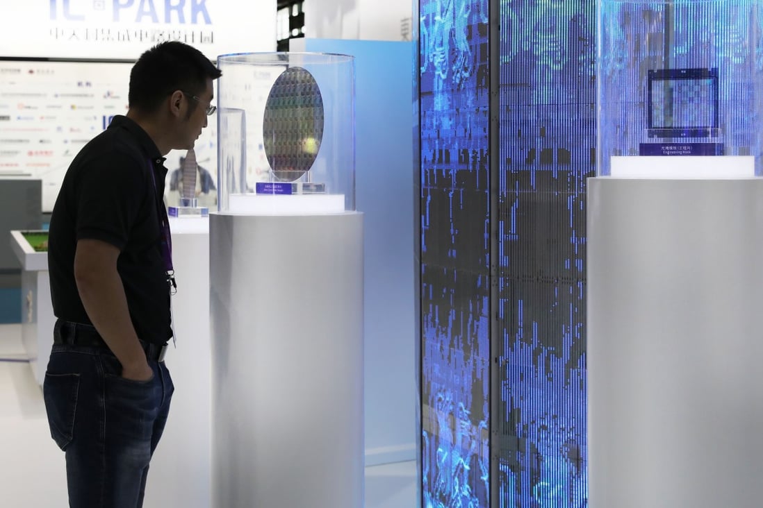 A visitor views the exhibits during the 17th China International Semiconductor Expo in Shanghai on September 3, 2019. Travel and trade restrictions are now putting small Chinese semiconductors companies front and centre at domestic expos as the government pushes for self-reliance. Photo: Xinhua