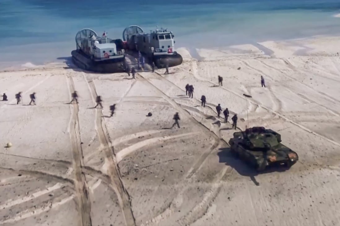 Marines land on an island during one of the recent drills. Photo: PLA Navy