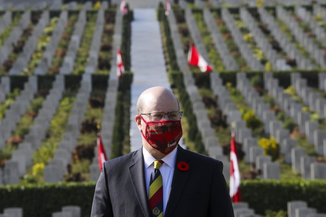 Jeff Nankivell, consul general of Canada in Hong Kong and Macau, attends an annual ceremony at the Sai Wan War Cemetery on December 6 last year, to remember Canadian soldiers who died in Hong Kong during World War II. Nankivell said his consulate’s work has been affected by the national security law enacted last June. Photo: K.Y. Cheng