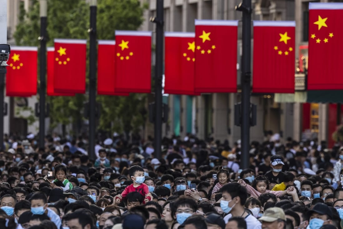 People walk to the Bund during Labour Day in Shanghai on May 1. Photo: EPA-EFE