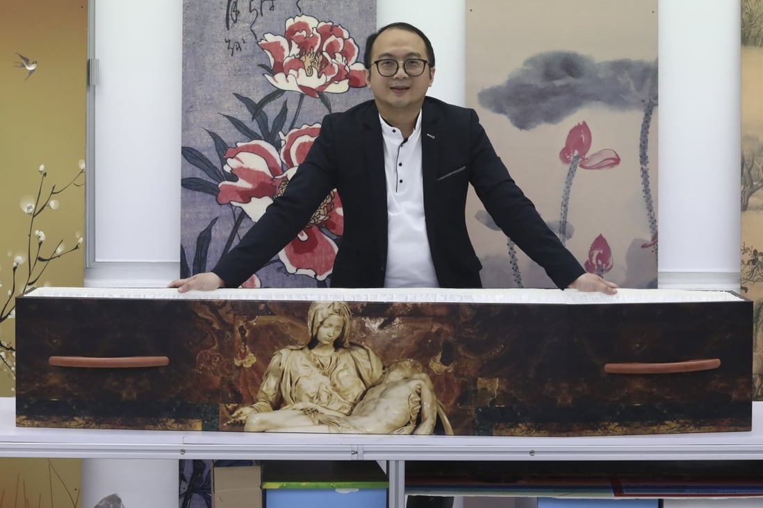 Wilson Tong, chief representative of LifeArt in Hong Kong, believes eco-friendly cardboard caskets and coffins are the way of the future. Photo: Jonathan Wong