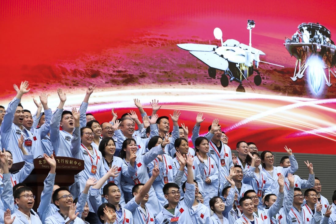 Members at the Beijing Aerospace Control Centre celebrate after China's Tianwen-1 probe successfully landed on Mars. Photo: Xinhua