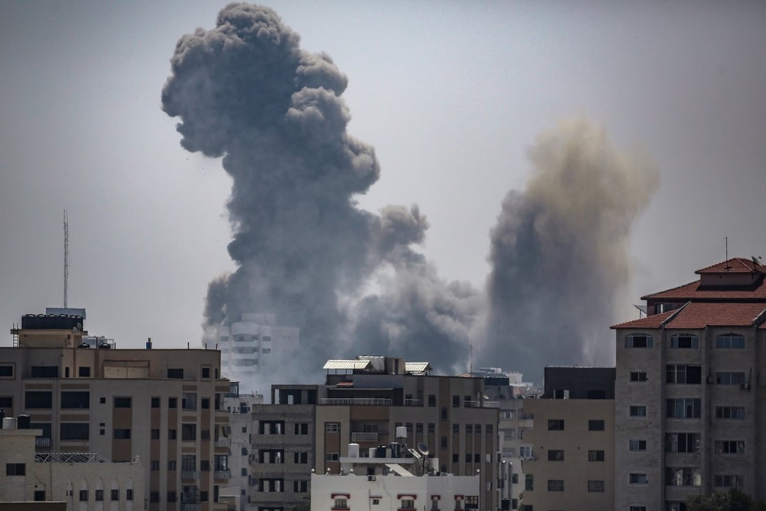 Smoke rises after an Israeli air strike on Sunday which killed 13 Palestinians and wounded more than 40. Photo: EPA-EFE