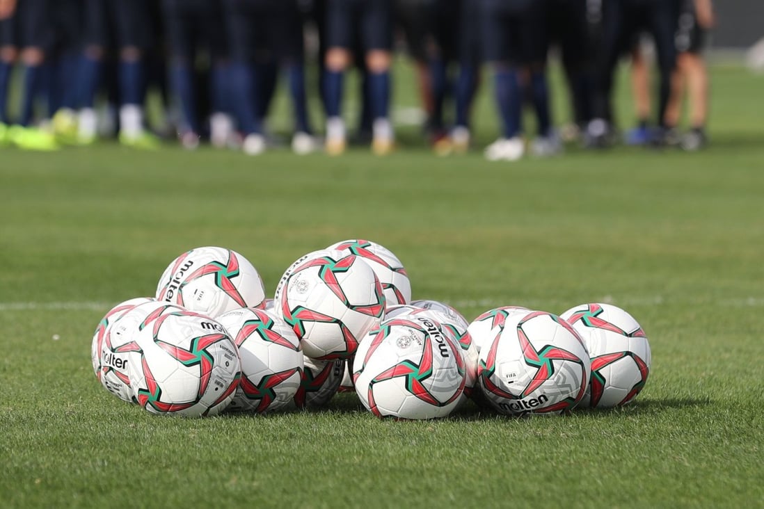Footballs pictured in a training session. Photo: AFP