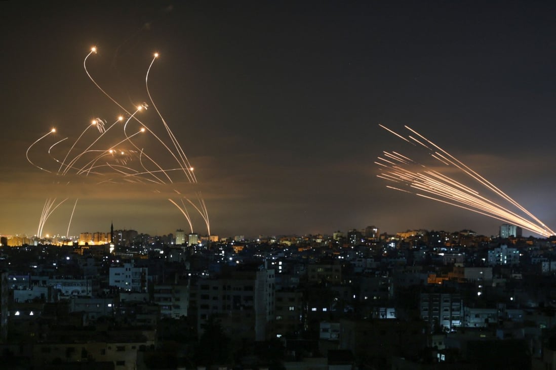 Rockets are seen in the night sky fired towards Israel from Beit Lahia in the northern Gaza Strip on May 14, 2021. Photo: AFP