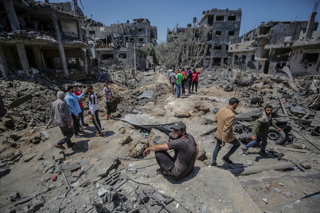 Palestinians inspect their destroyed houses after Israeli air strikes in Beit Hanun town in the northern Gaza strip on May 14. Photo: EPA-EFE