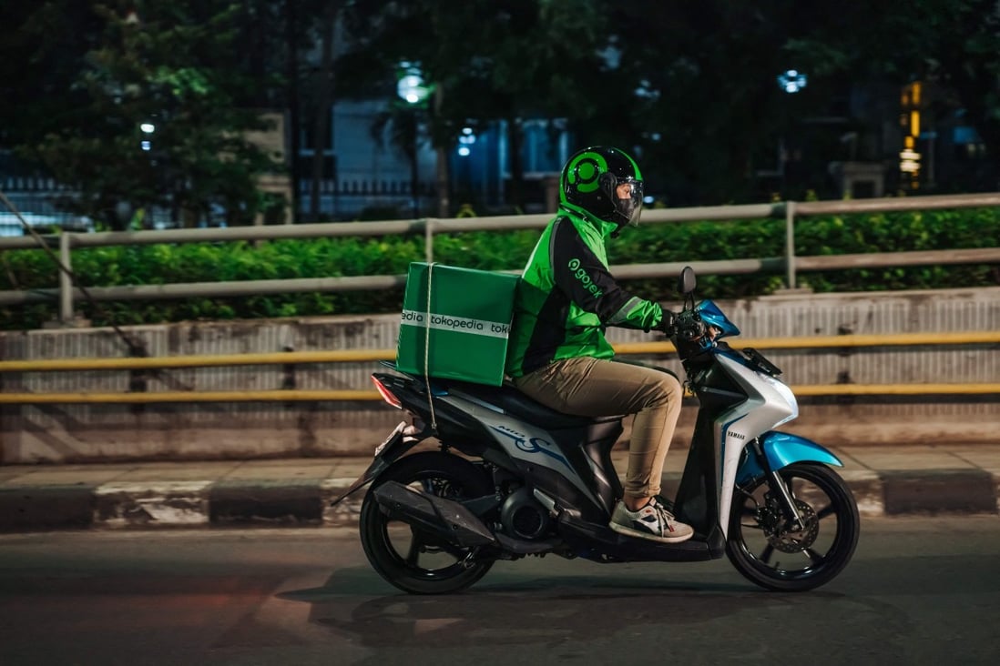 A Gojek rider delivers a Tokopedia package in Jakarta. An IPO this year could make GoTo one of, if not the, most valuable technology companies in Southeast Asia. Photo: AFP