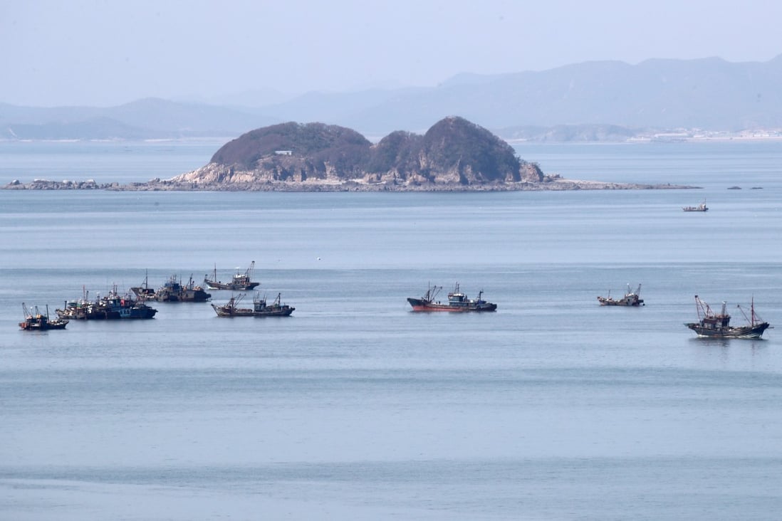 Some of the suspected illegal Chinese fishing boats, as viewed from Yeonpyeong Island. Photo: Yeonpyeong County