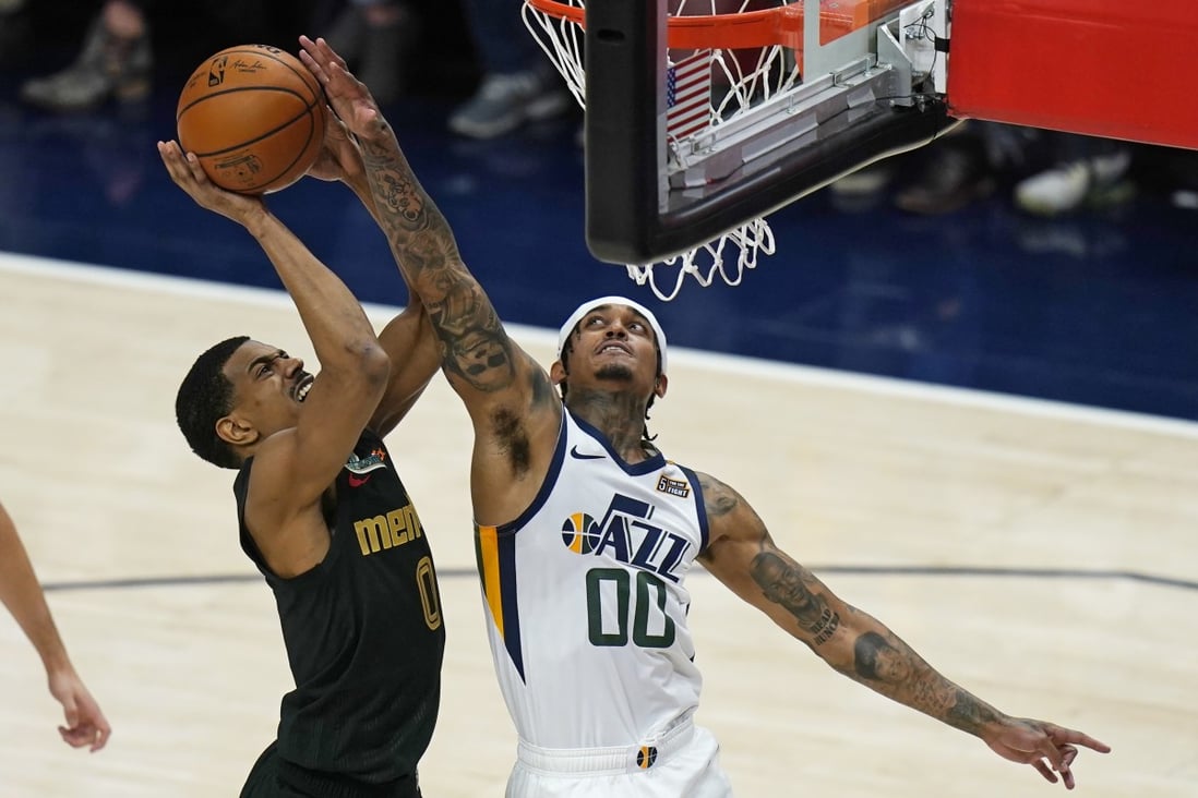 Utah Jazz guard Jordan Clarkson (No 00) blocks the shot of Memphis Grizzlies guard De'Anthony Melton in Game 1 of the NBA 2021 Play-offs. Filipino-American Clarkson has been named the NBA’s Sixth Man of the Year. Photo: AP