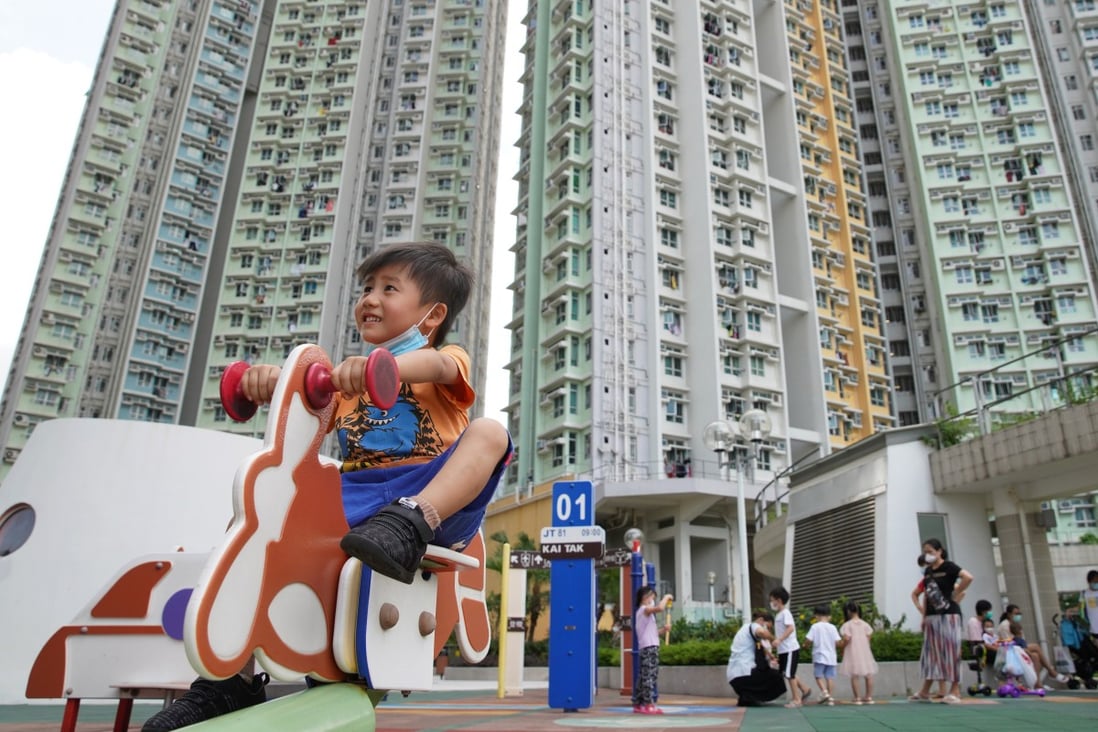 A child plays outside a public housing estate in Kai Tak. The waiting time for a public housing flat in Hong Kong is nearly six years. Photo: Winson Wong