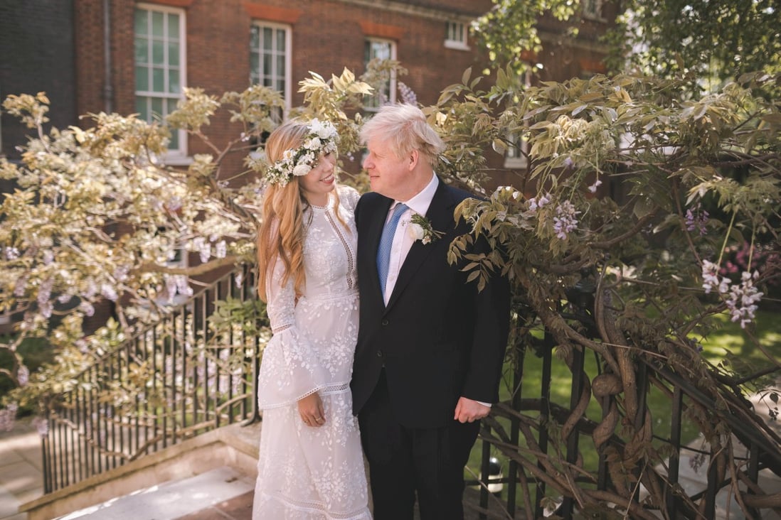 UK Prime Minister Boris Johnson and his wife Carrie in the garden of 10 Downing Street, London, after their wedding. Photo: Rebecca Fulton via Reuters