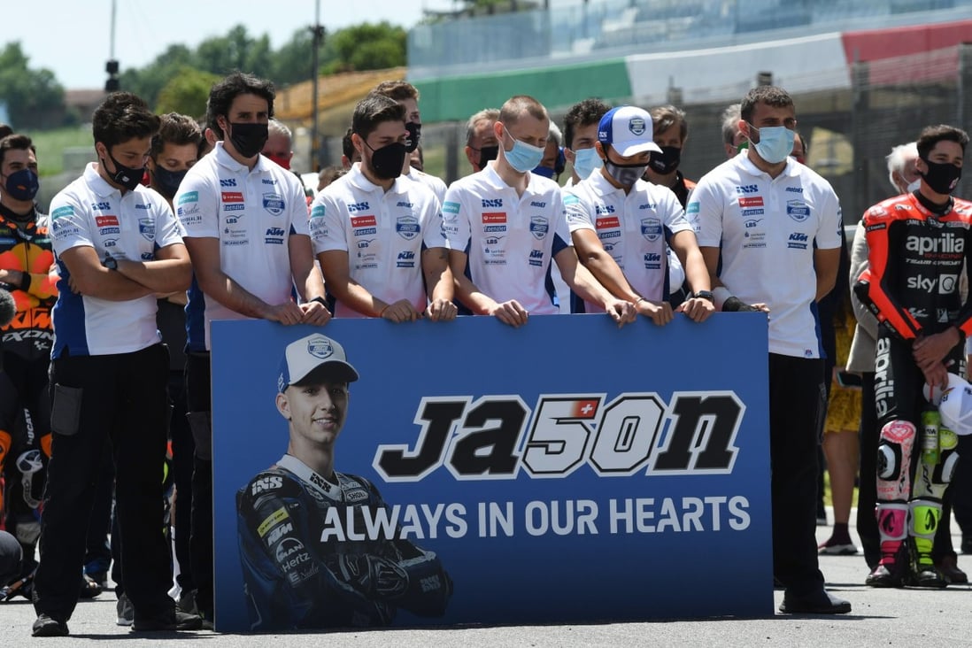 MotoGP riders and teams line up for a one-minute of silence in memory of Jason Dupasquier, who died at the Mugello circuit in Scarperia, Italy on Sunday. Photo: EPA-EFE
