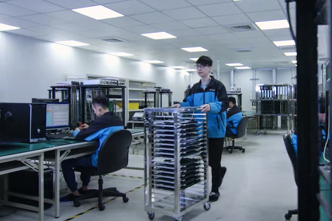 Workers are seen inside a chip-testing plant of King Yuan Electronics Co in Taiwan. Photo: Handout