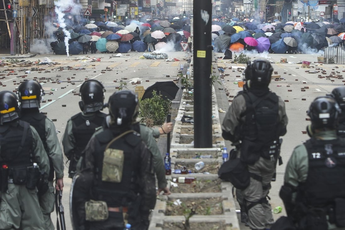 Hong Kong protests: two men who took part in demonstration aimed at ...
