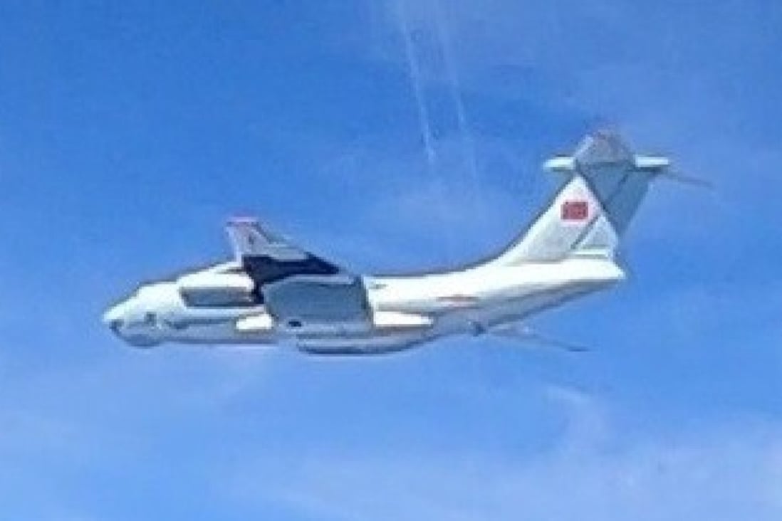 A plane with a Chinese flag on its tail is seen in this handout picture from the Royal Malaysian Air Force. Photo: Royal Malaysian Air Force handout via Reuters
