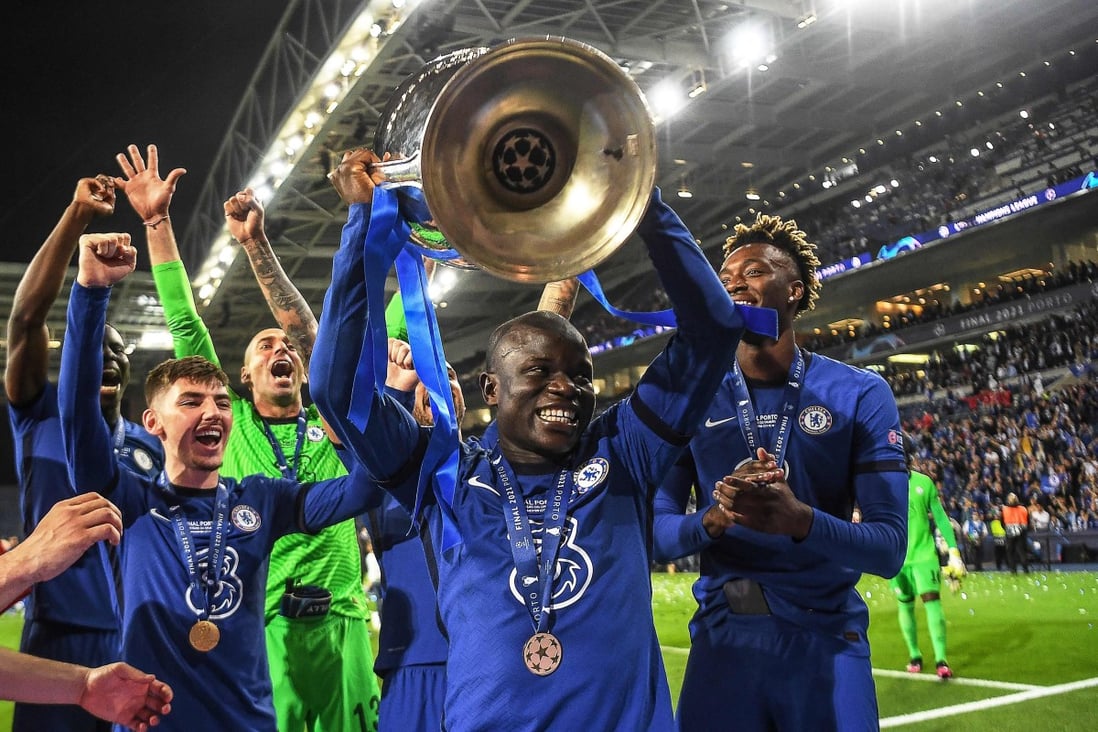 Chelsea’s French midfielder N’Golo Kante lifts the trophy after winning the 2020-21 Uefa Champions League. Photo: AFP