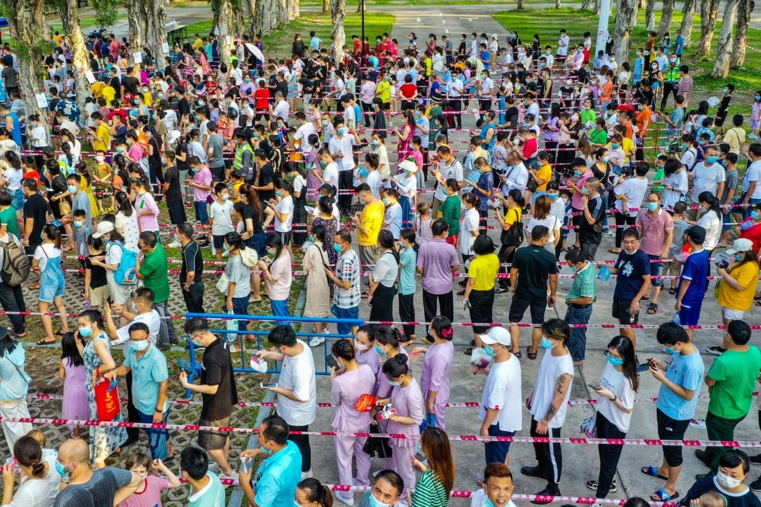 Residents line up to get tested in the township of Changan in Dongguan on Saturday. Photo: VCG