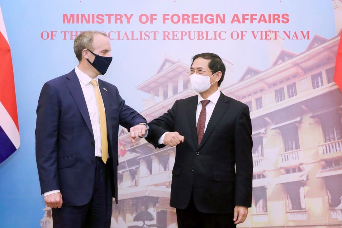 Britain’s Foreign Secretary Dominic Raab with Vietnamese Foreign Minister Bui Thanh Son in Hanoi. Photo: AP