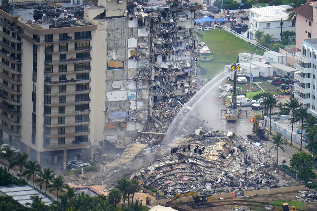 Rescue personnel work at the remains of the Champlain Towers South building in Surfside, Florida. Photo: AP