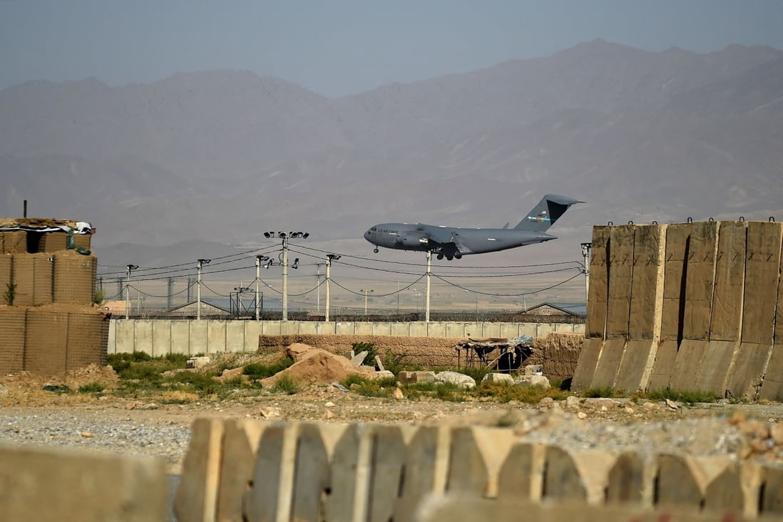 A US military transport aircraft landing at Bagram on Thursday. Photo: AFP