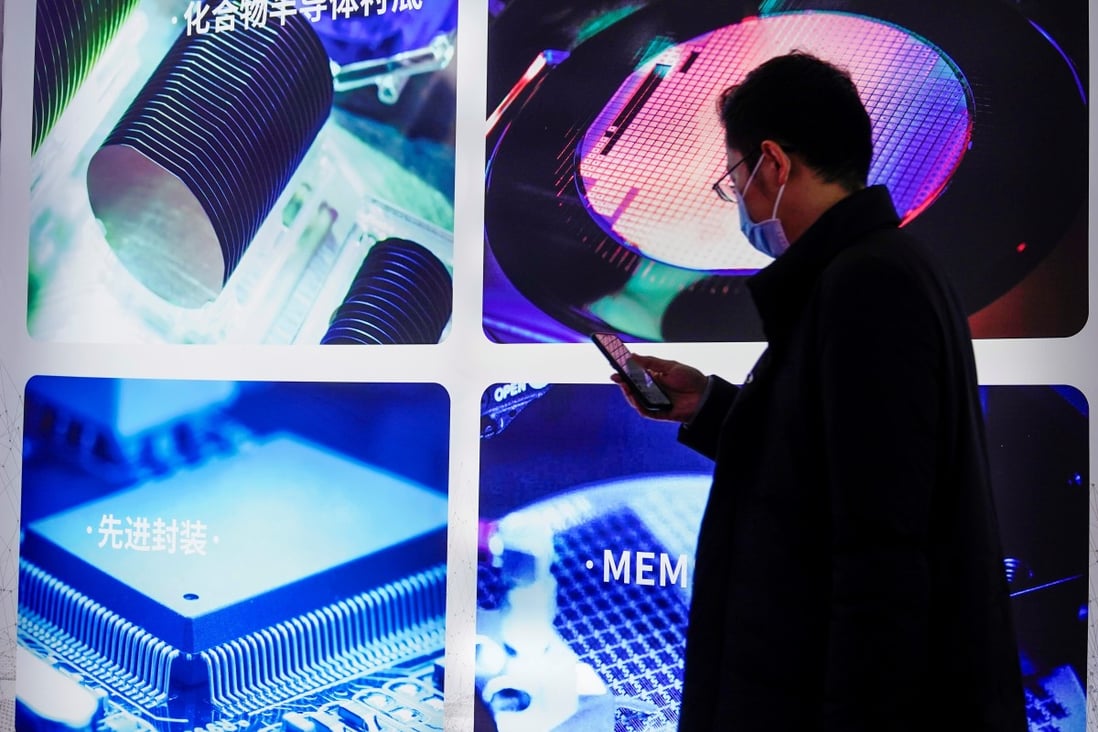 A man visits a display at Semicon China, a trade fair for semiconductor technology, in Shanghai in March. Photo: Reuters