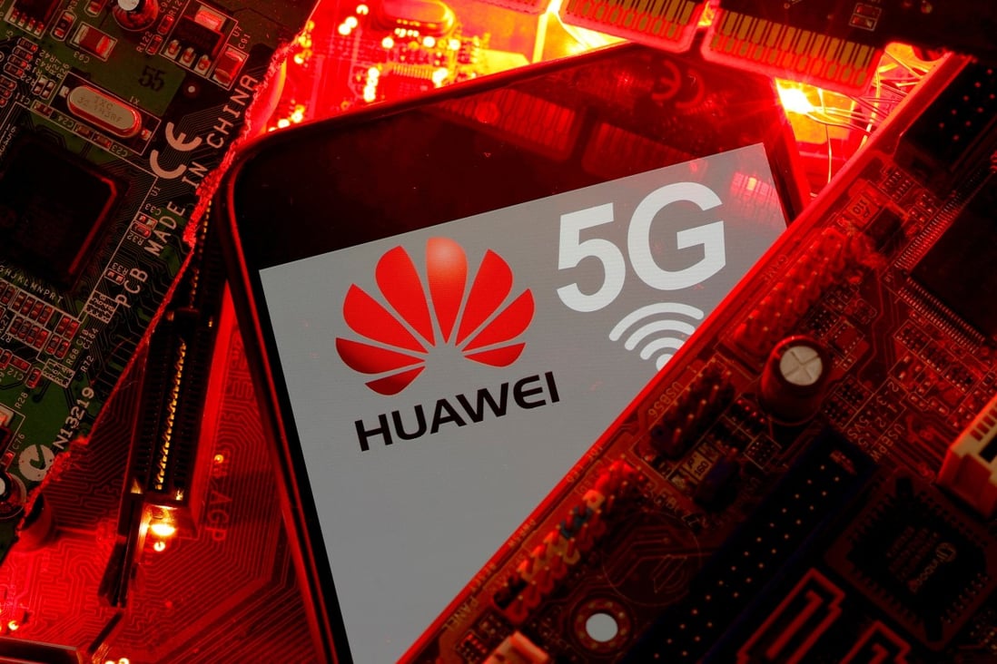 A smartphone with the Huawei and 5G network logo seen on a PC motherboard in this illustration picture taken January 29, 2020. Photo: Reuters