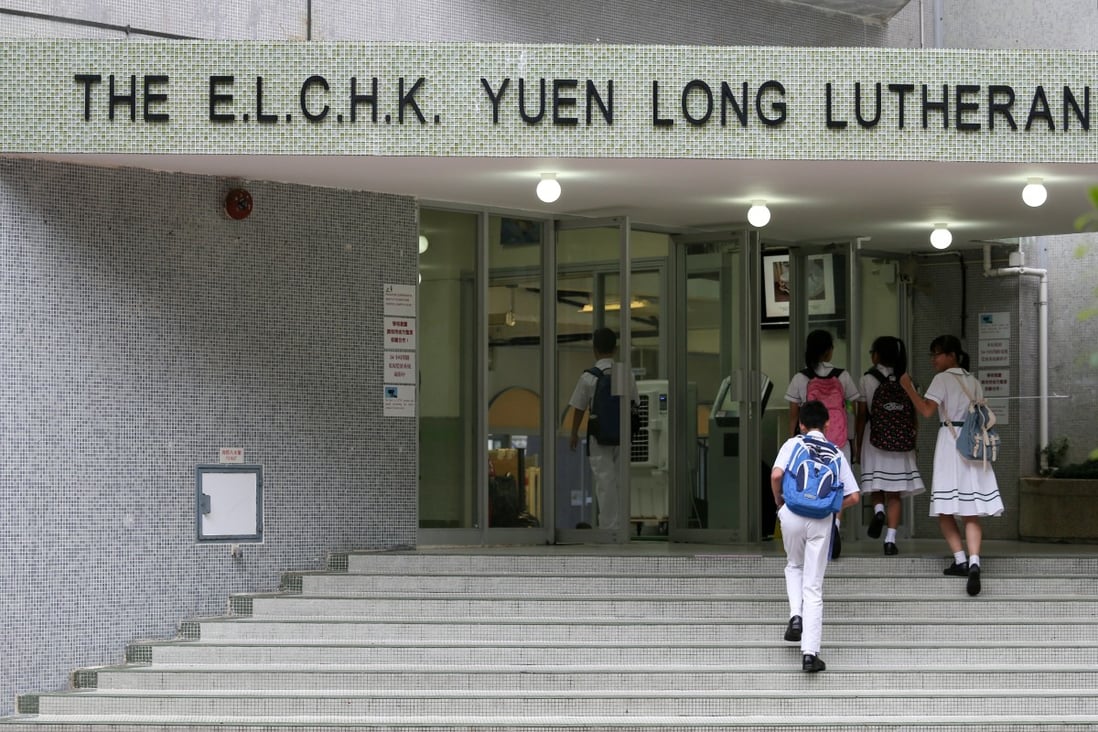 The two students attend the ELCHK Yuen Long Lutheran Secondary School. Photo: K. Y. Cheng