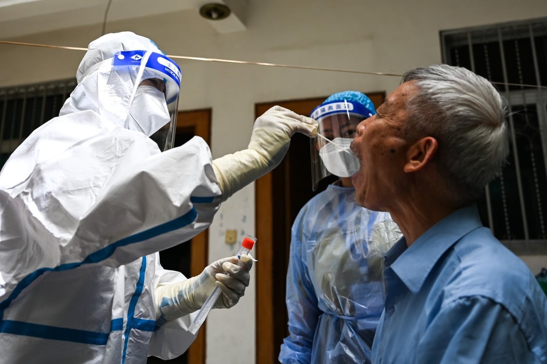 A resident gets tested in Ruili, Yunnan province on Thursday. The city on the border with Myanmar has been hit by a fourth wave of Covid-19. Photo: Xinhua