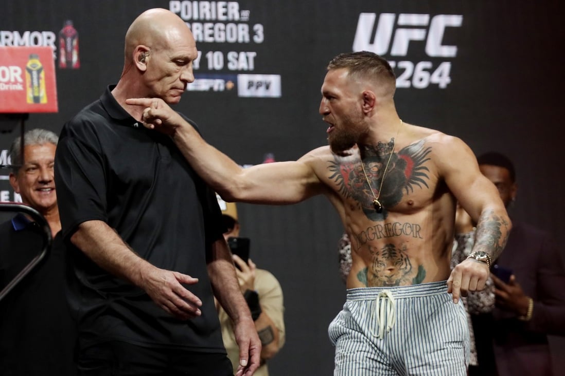 Conor McGregor gestures at Dustin Poirier during the UFC 264 ceremonial weigh-in. Photo: Reuters