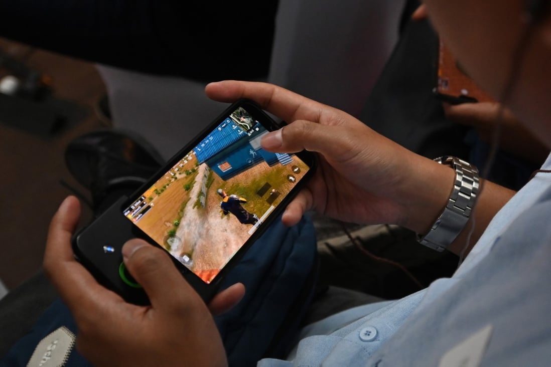 Tencent is integrating a system that tries to pinpoint kids who are violating Chinese laws regulating the time allowed playing mobile games. Photo: AFP