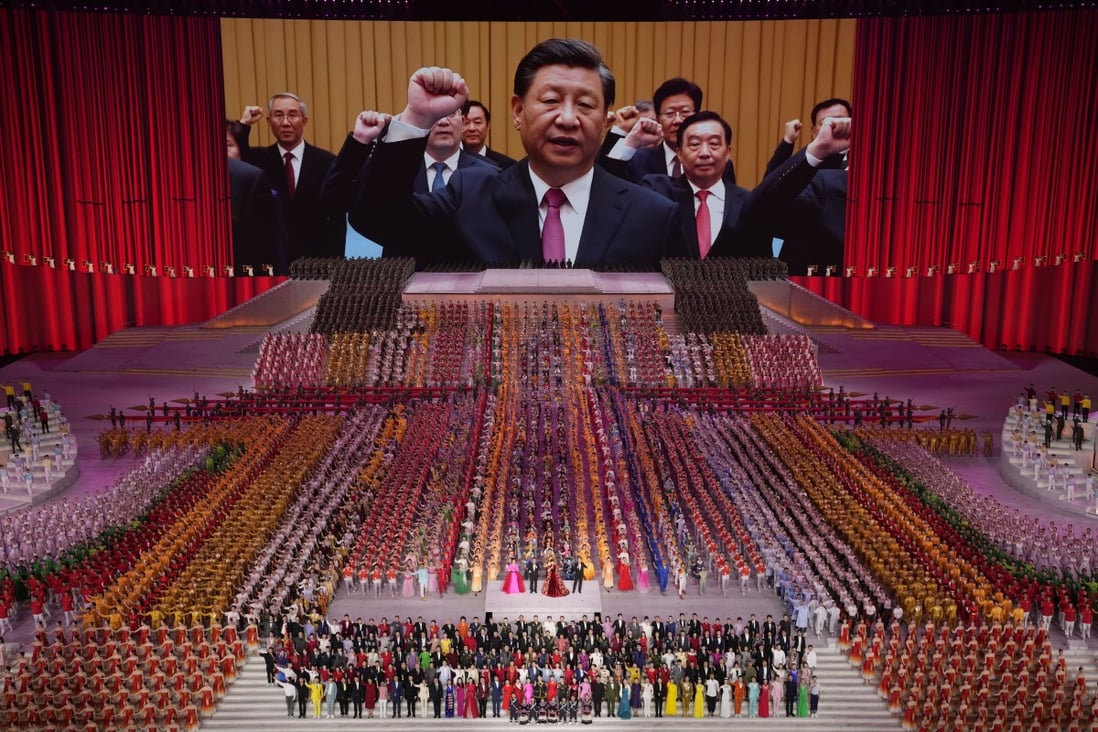 Images of Xi Jinping and other senior officials are beamed to the audience at a gala show ahead of the Communist Party’s centenary celebrations. Photo: AP