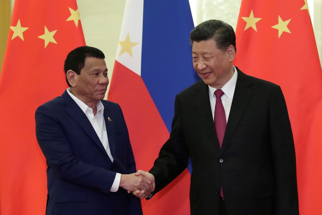 Philippine President Rodrigo Duterte shakes hands with Chinese President Xi Jinping in Beijing in 2019. Photo: Reuters