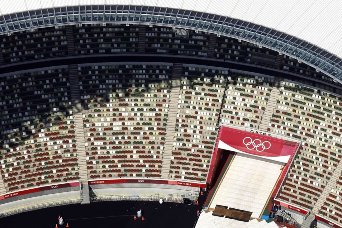 Empty seats inside Tokyo’s National Stadium. Japan had expected 7.8 million spectators but banned all fans due to a coronavirus state of emergency in the capital. Photo: Kyodo