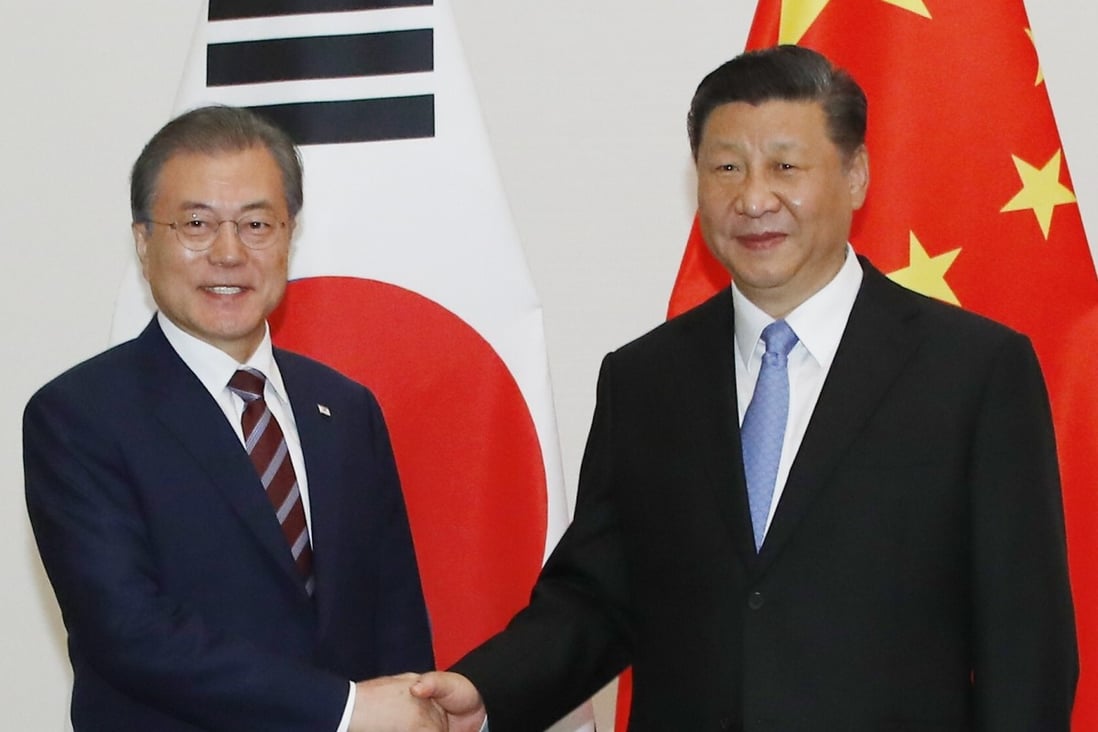 South Korean President Moon Jae-in with Chinese President Xi Jinping in 2019. Photo: EPA