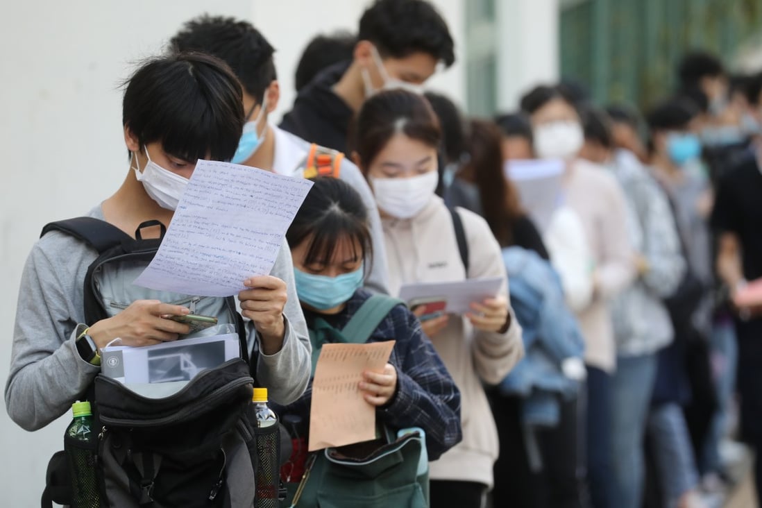 Secondary school students wait to take the Hong Kong Diploma of Secondary Education exam in Shek Kip Mei. Photo: Winson Wong