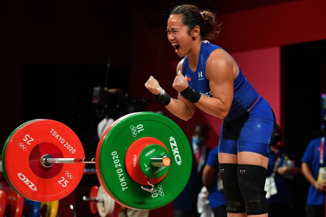 Philippines’ Hidilyn Diaz reacts while competing in the women’s 55kg weightlifting competition during the Tokyo 2020 Olympic Games at the Tokyo International Forum. Photo: AFP
