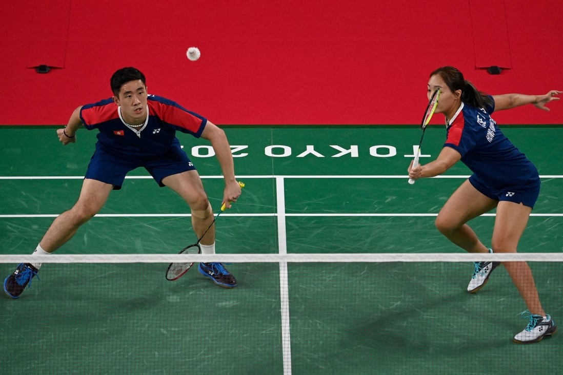 Hong Kong's Tang Chun-man (L) and Tse Ying-suet take on Britain's Marcus Ellis and Lauren Smith in their quarter-final match up at the Tokyo Olympics on Wednesday. Photo: AFP
