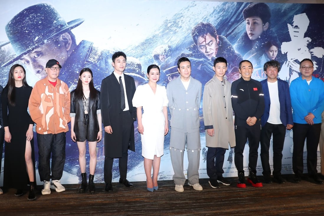 Chinese director Zhang Yimou and well-known actor Ni Dahong at the premiere of sky thriller Cliff Walkers. Photo: Getty Images
