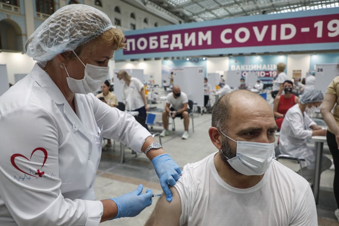 A Russian man receives a shot of the Sputnik V vaccine in Moscow. Photo: EPA