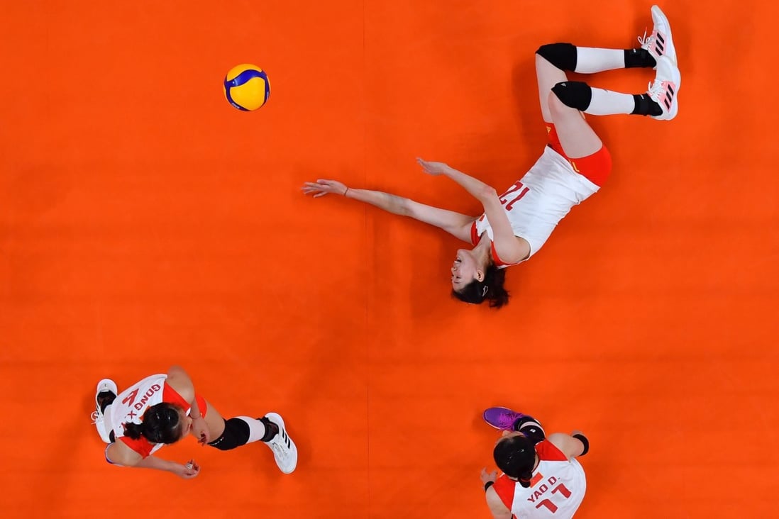 Li Yingying falls on the ground during China’s group B volleyball match defeat by the Russian Olympic Committee. Photo: Xinhua