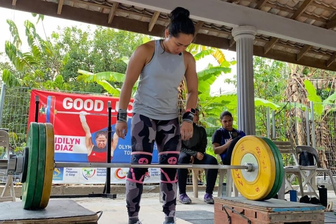Hidilyn Diaz trains in her makeshift backyard gym in Malaysia, as she prepares for the Tokyo 2020 Olympics. Photo: Handout
