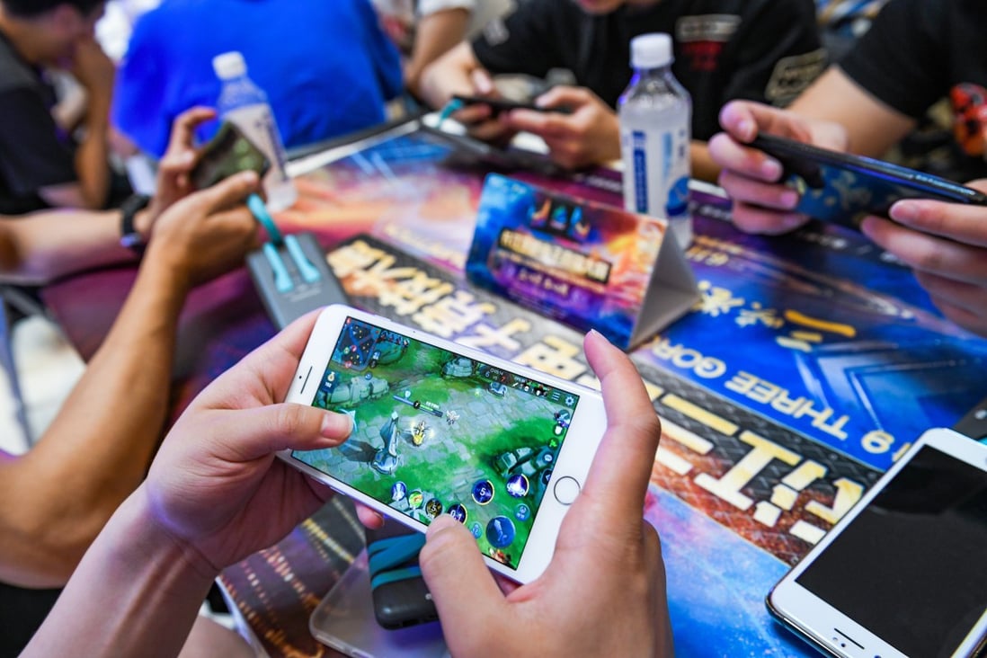 Players competing in a match of Tencent's mobile game honour of Kings during the 3rd Yangtze River Three Gorges esports Games (TGEG) in Chongqing on 14 July 2019. Photo: Imaginechina