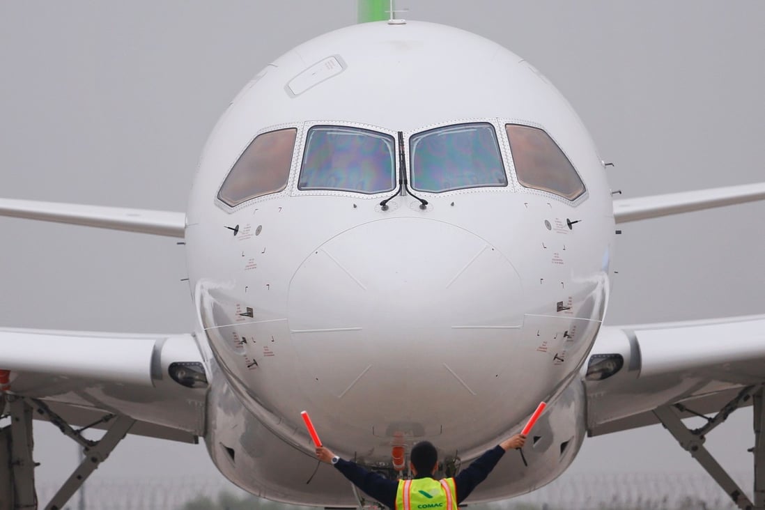 China’s home-grown C919 passenger jet after landing at Pudong International Airport in Shanghai. Photo: AFP