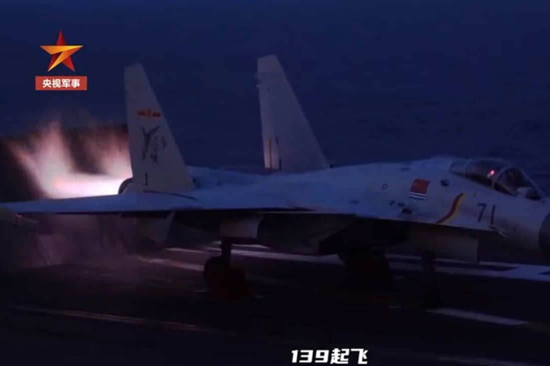 A Chinese fighter pilot prepares for a night take-off on the Liaoning aircraft carrier. Photo: Handout