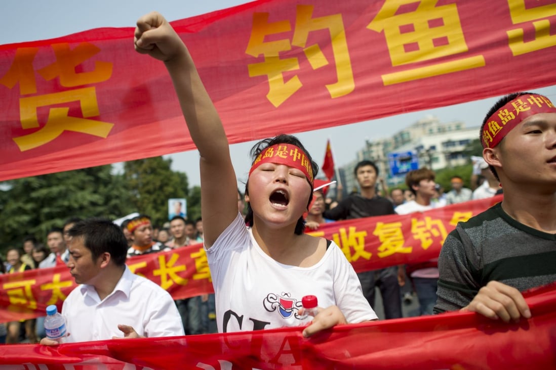A Chinese demonstrator attends a protest against Japan’s “nationalising” of Diaoyu Islands, known as the Senkakus in Japan. Photo: AFP