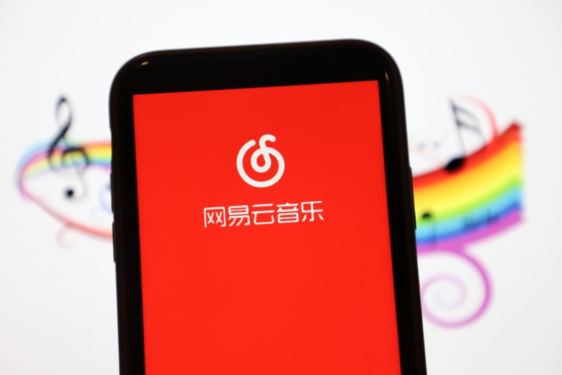 A mobile phone shows NetEase’s Cloud Music app. The company has indefinitely shelved its Hong Kong IPO plans. Photo: Barcroft Media via Getty Images