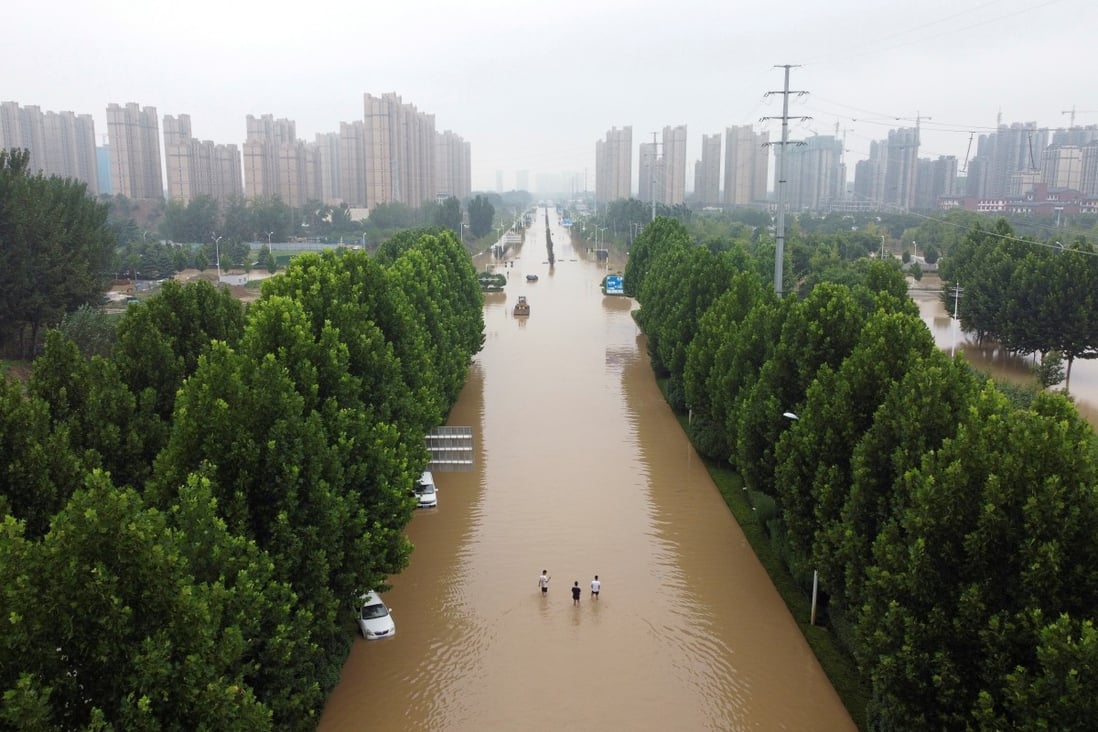 An aerial view shows a flooded road following heavy rainfall in Zhengzhou, Henan province, last month. A UN report warned that climate change will lead to more intense rainfall and flooding in many parts of the world. Photo: Reuters