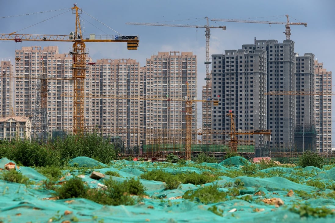 Qingdao in Shandong province halted the centralised auction of 100 plots of land on Wednesday. Photo: EPA